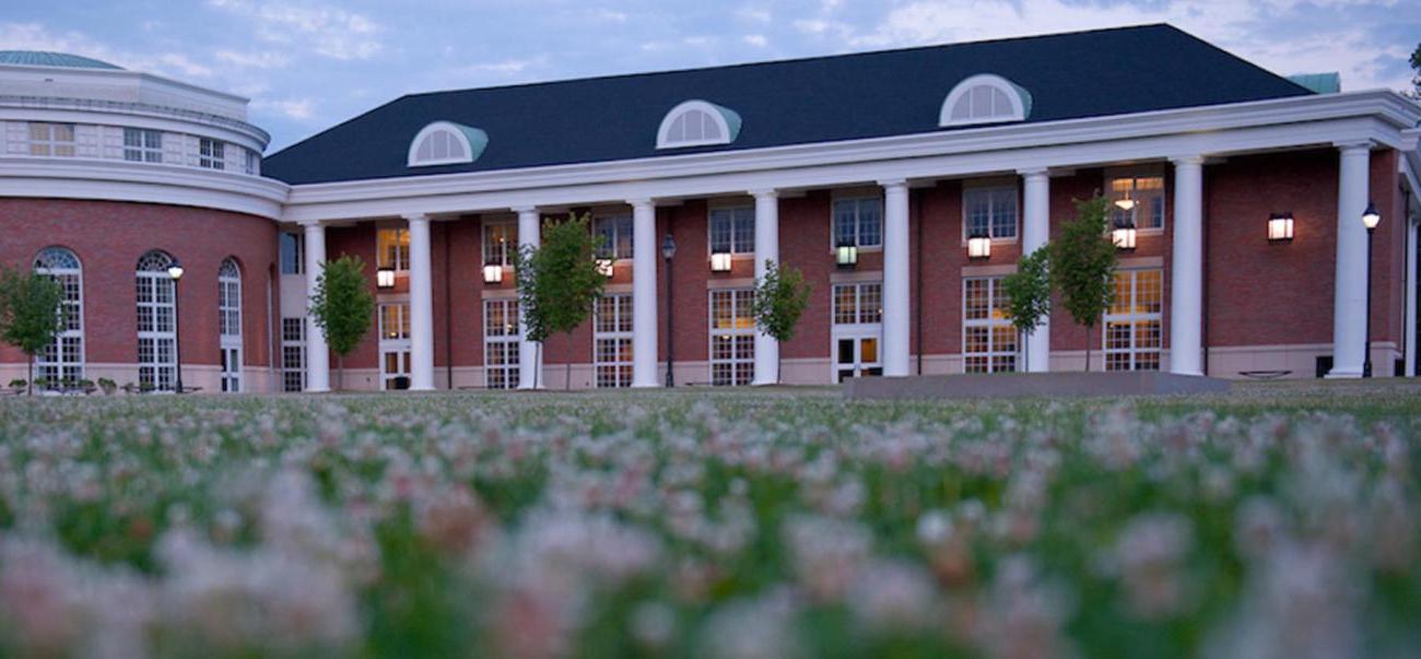 Walter Hall with flowers in the foreground 