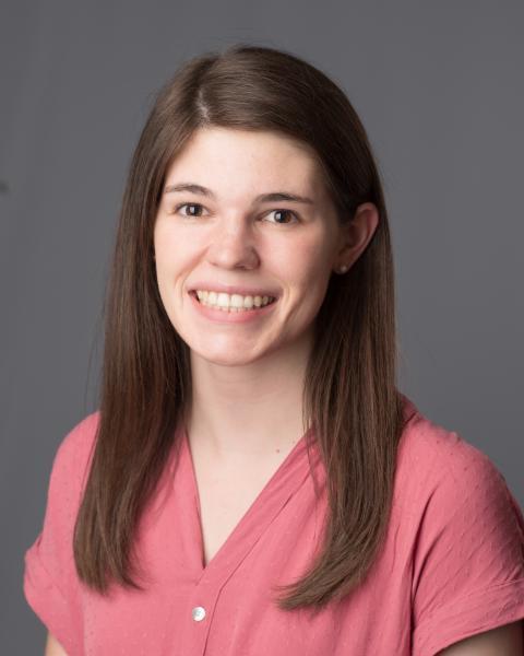 woman with brown hair smiling